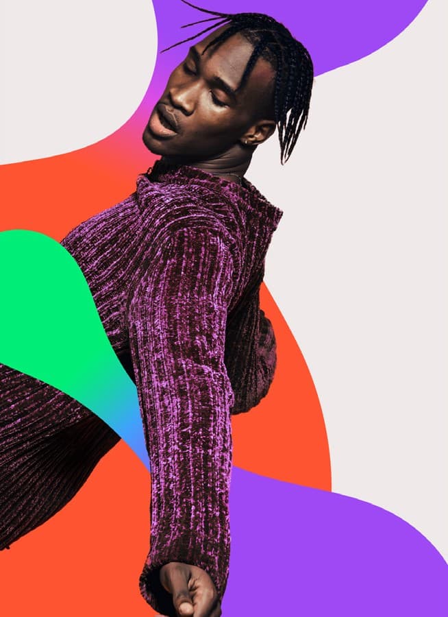 Hombre con trenzas y suéter morado baila, sobre formas violeta, roja y verde